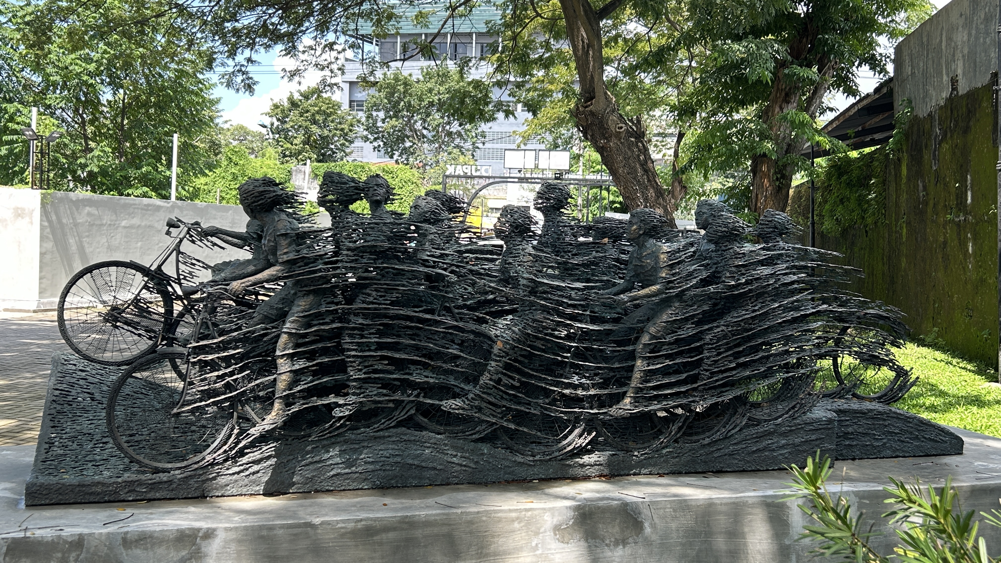 Rush Hour, a sculpture by Nyoman Nuarta, on its plinth at Dupak 36.